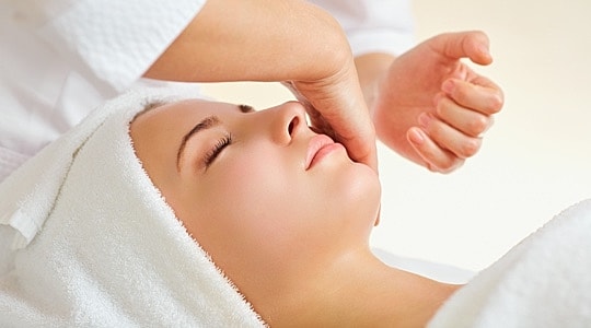 Facial treatment in a spa setting.